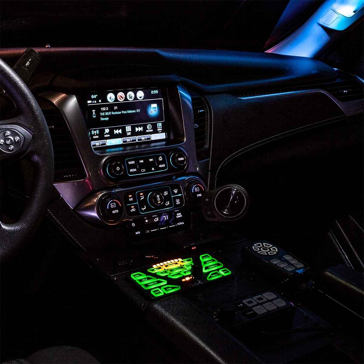 Car interior with Feniex 4200 Data-Link Controller and steering wheel