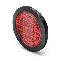 Red circular light with black rim on a white background