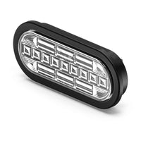 Oval Feniex 6" Oval STTR LED light with black frame on a white background