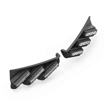 Two black Feniex Fusion Spoiler LED light brackets on a white background