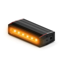 Feniex Q Serial 100 Stick Rectangular LED light with orange glow on a white background