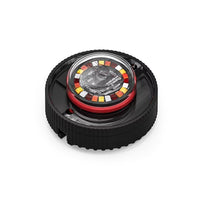 A Feniex Quad Cannon emergency warning light with a black housing

