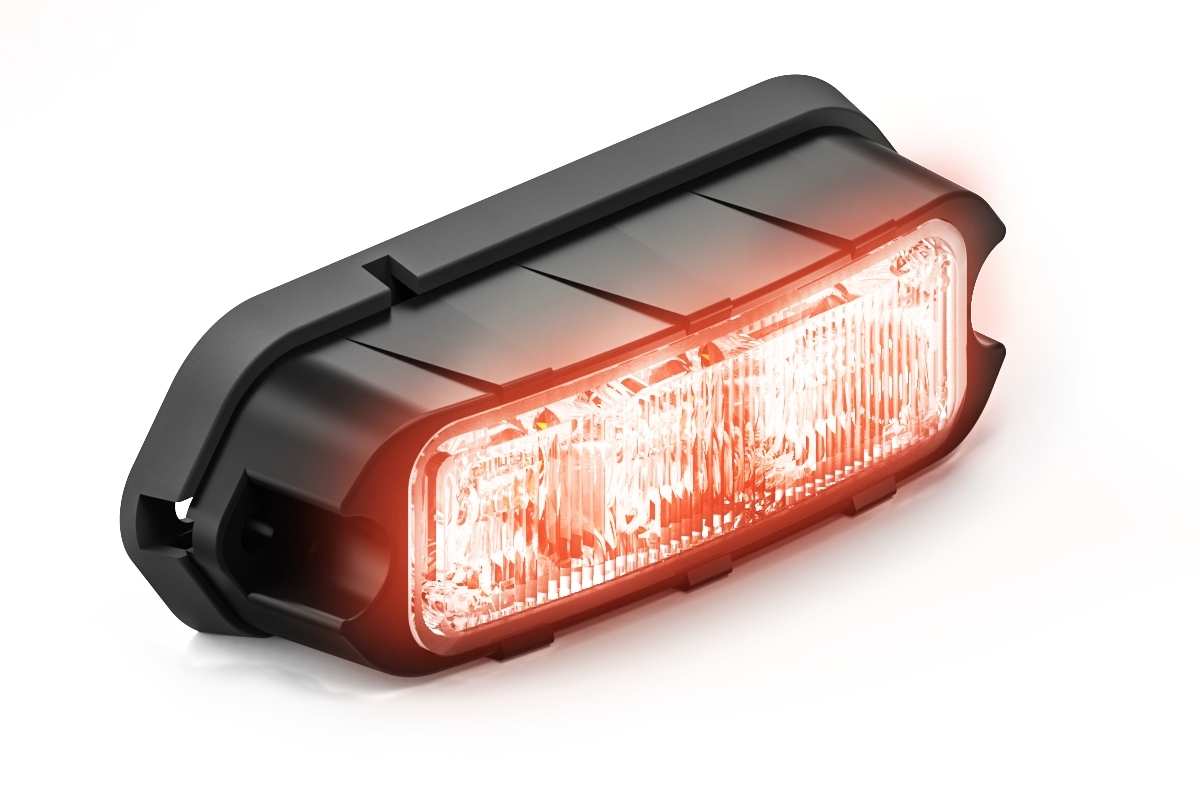 Rectangular Feniex Quad Q3 with red glow on a white background