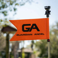 Guardian Angel - 24" Marine Tube and Orange flag with 'GA Guardian Angel' logo on a blurred natural background