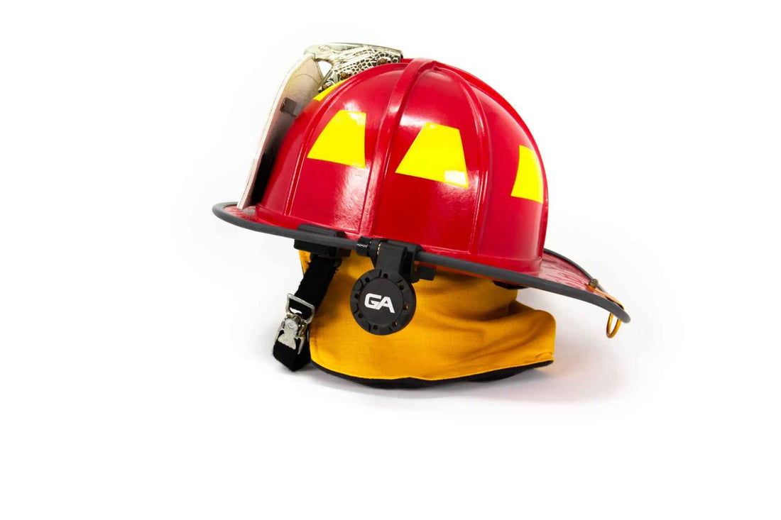 Red and yellow firefighter helmet with a visible brand logo on a white background