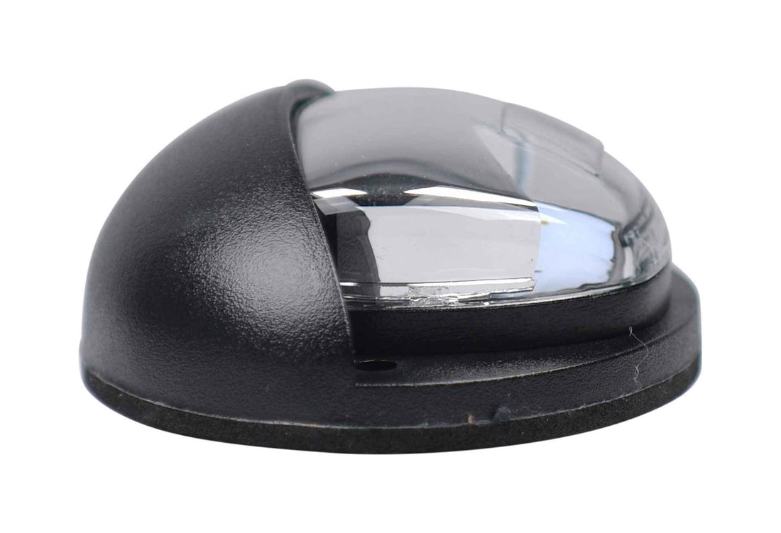 Black and clear dome-shaped Opti-luxx 4" Oval White Curb/Entry Light on a white background