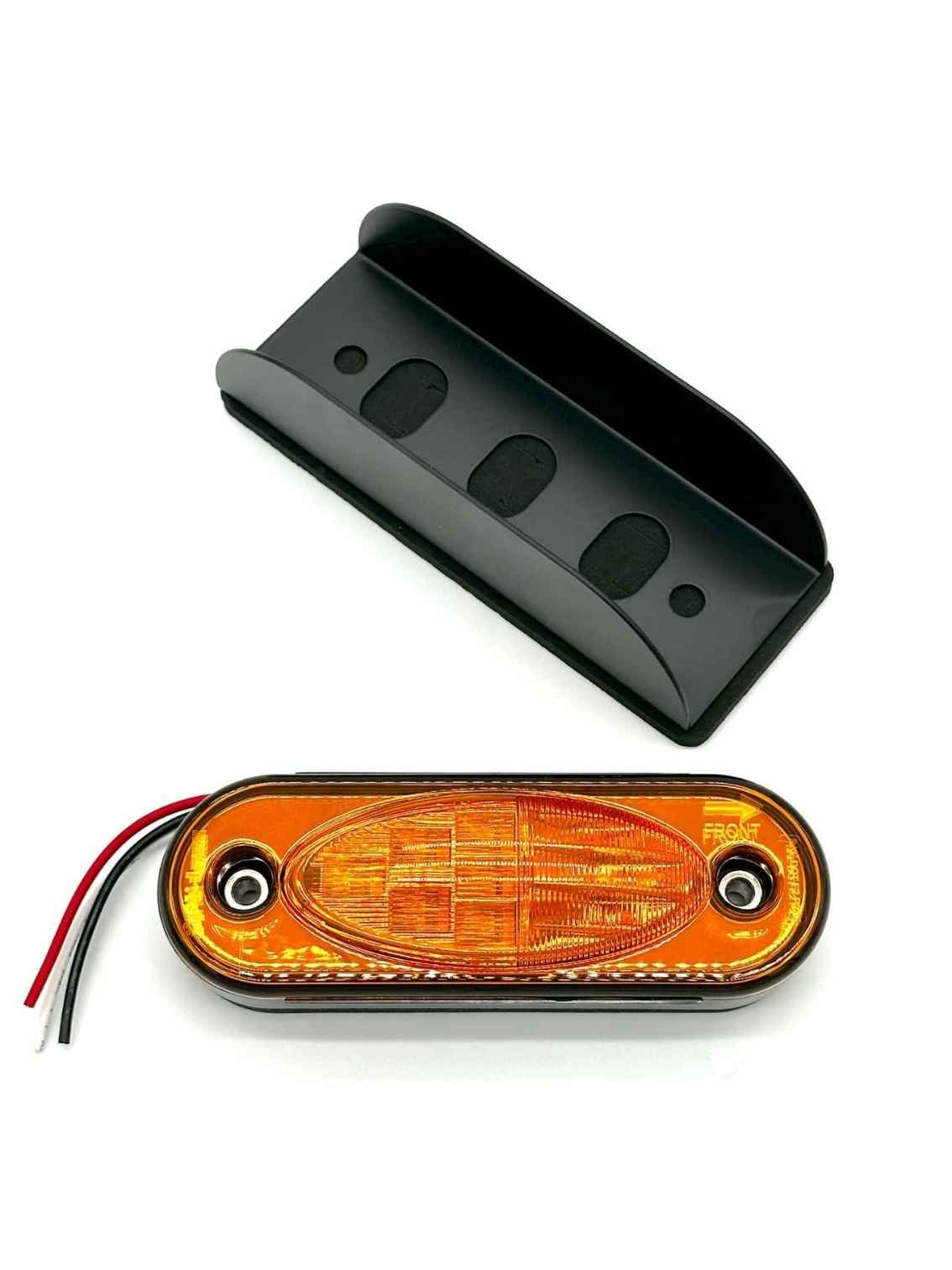 Orange LED marker light with black housing on a white background