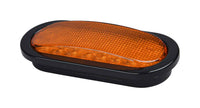 Opti-luxx 6" Oval Amber Turn with black border on a white background