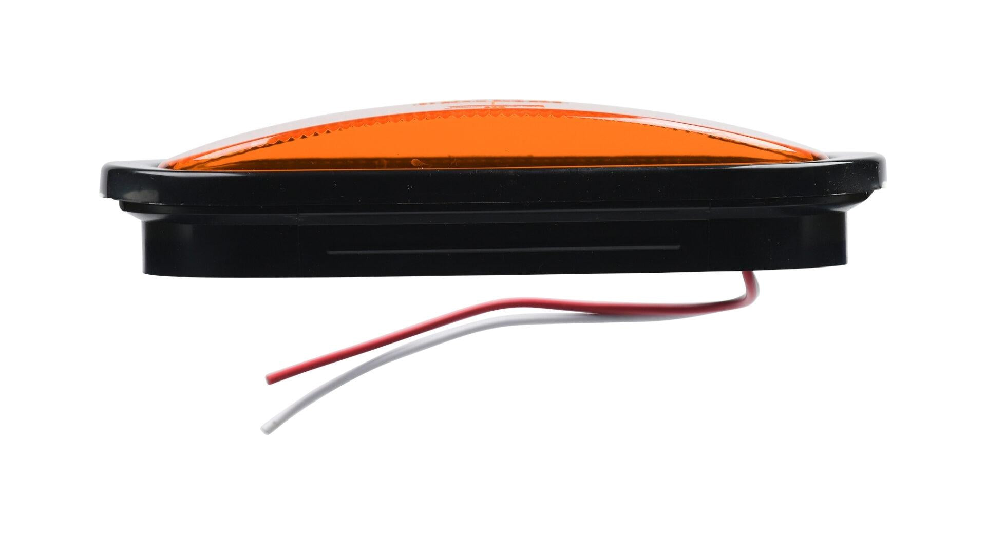 Opti-luxx 6" Oval Amber Turn with black casing and wiring on a white background