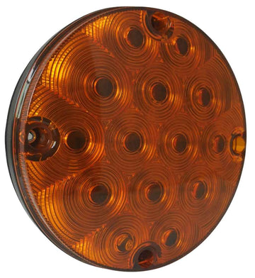 Round amber LED light with multiple lenses on a clear background