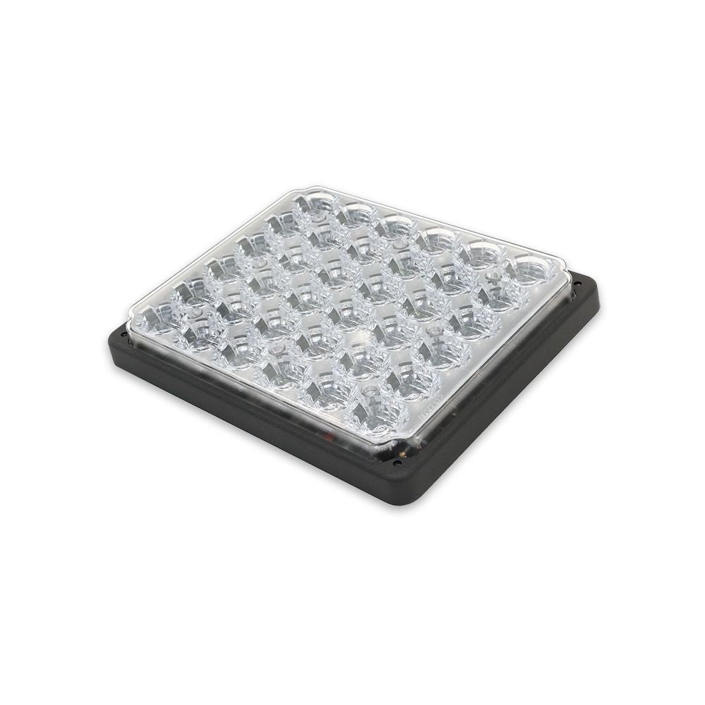 Rectangular LED light with clear cover and black frame on a white background