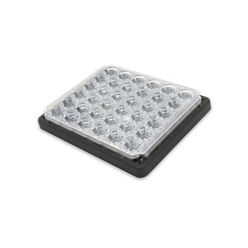 Rectangular LED light with clear cover and black frame on a white background
