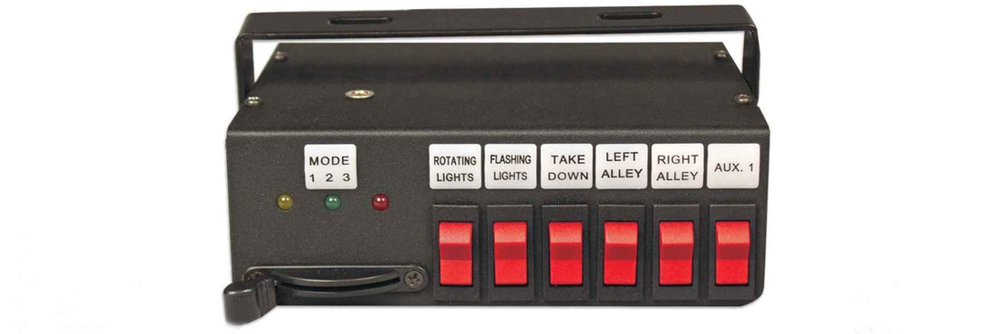 Control panel with red buttons and labeled switches on a white background