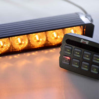 LED light bar with remote control on a reflective surface