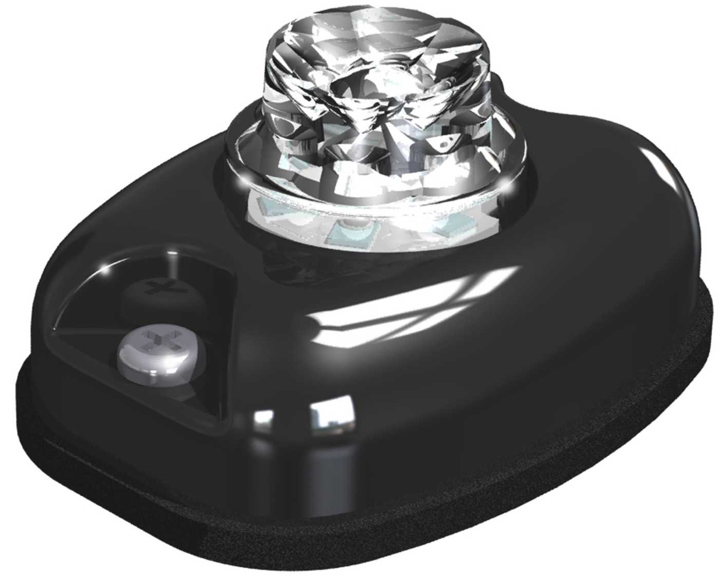 Black LED light with clear crystal-like top on a white background