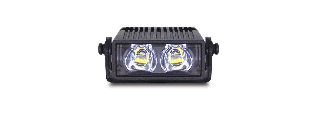 LED light bar with two bright lights on a white background