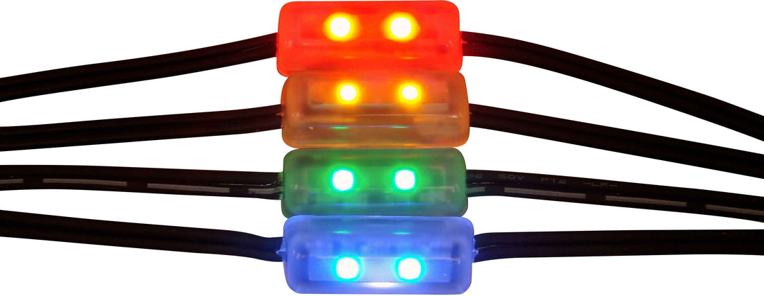 Set of LED lights in red, orange, green, and blue on a white background