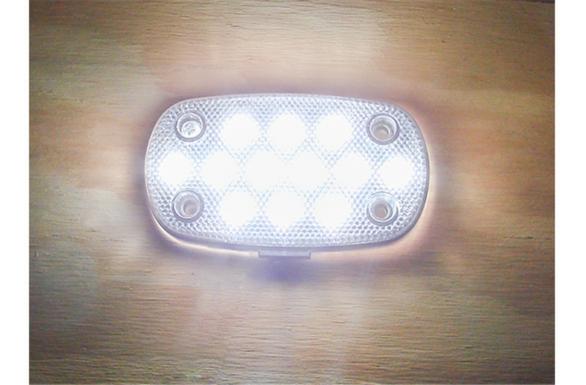 Rectangular LED light on a wooden surface