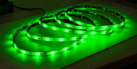 Green LED strip light on a flat surface
