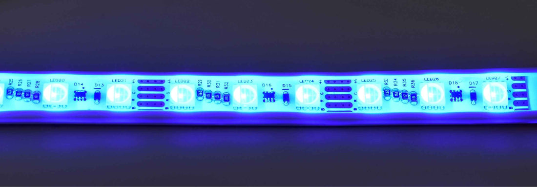 Blue LED strip light on a dark background