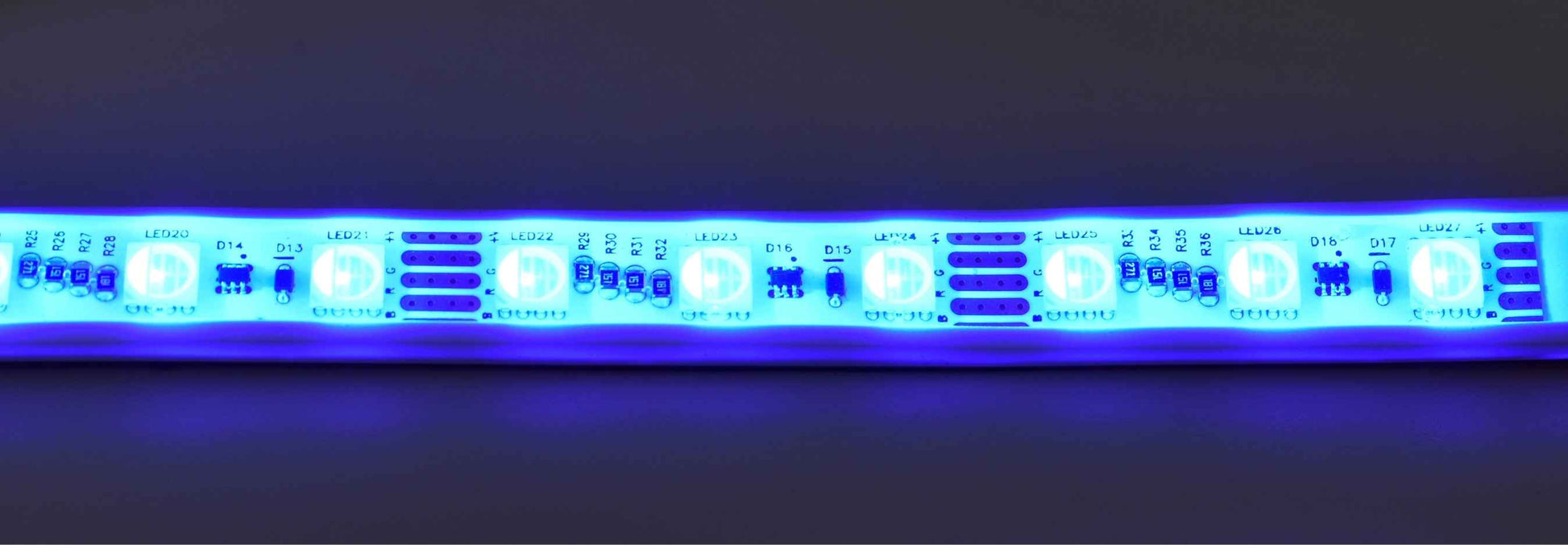 Blue LED strip light on a dark background