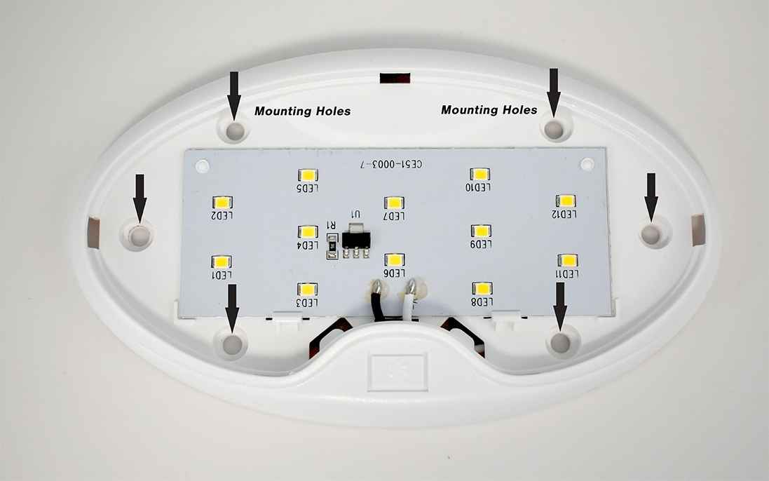 LED light panel with mounting holes and label on a white background