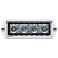 A white TecNiq P10 flush mounted spreader light with LED bulbs visible through a clear lens, designed for vehicle.