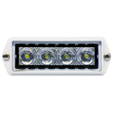 A white TecNiq P10 flush mounted spreader light with LED bulbs visible through a clear lens, designed for vehicle.
