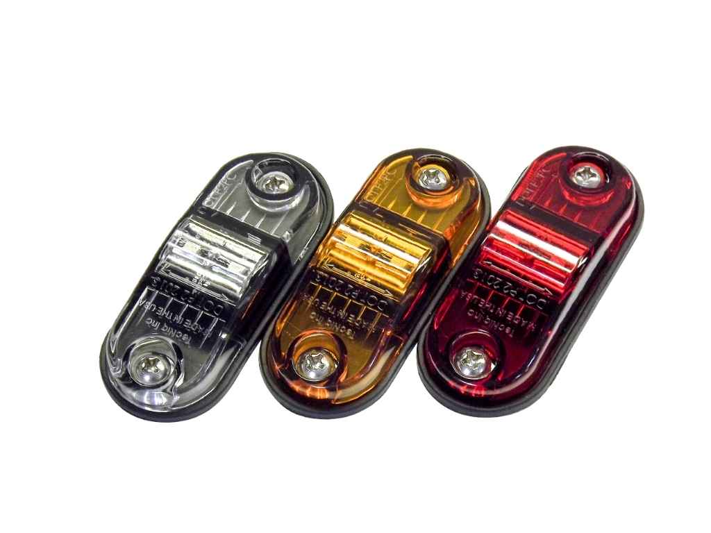 Three TecNiq S17 PC/P2 Rated Marker lights in black, orange, and red on a white background
