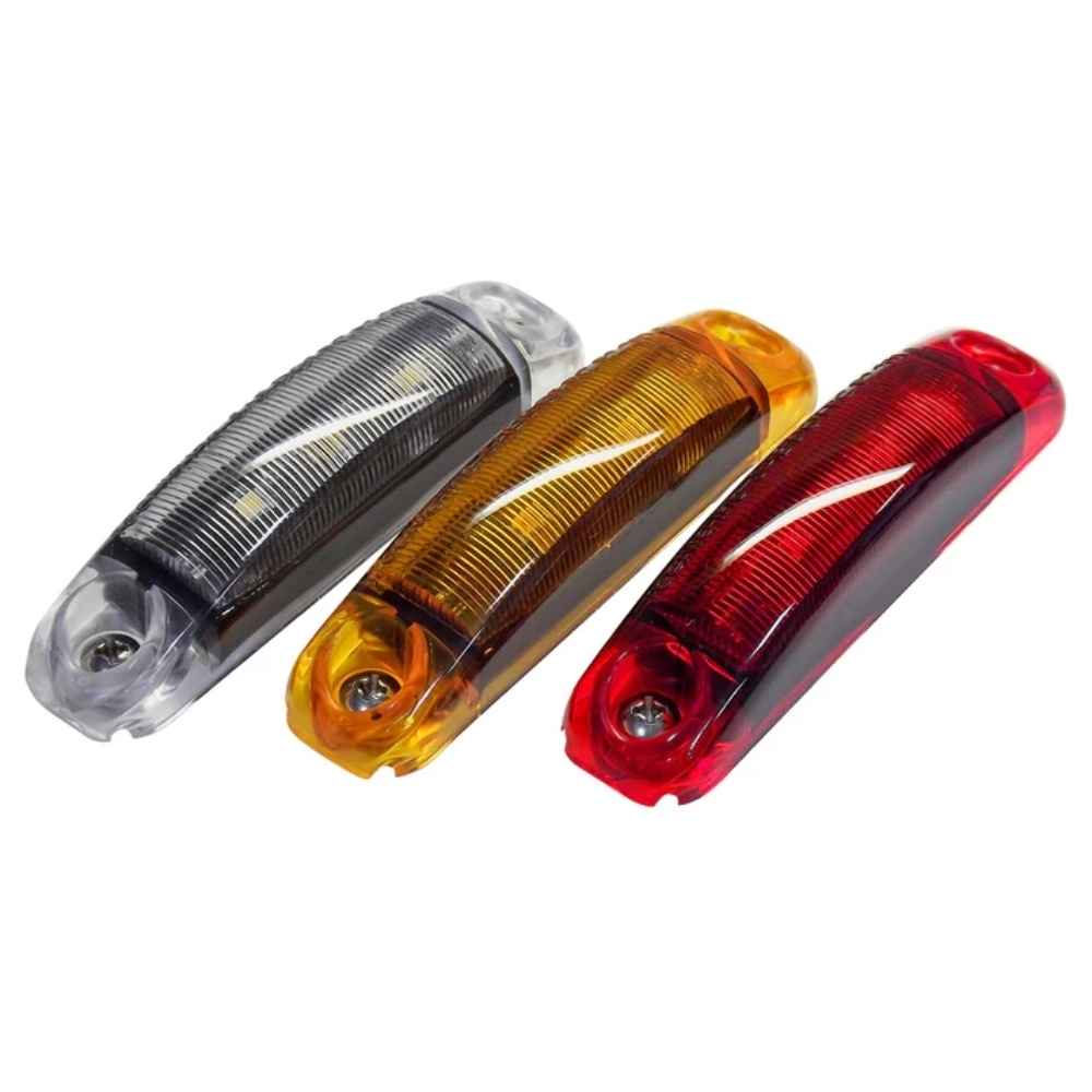 Three  TecNiq S18 : PC/P2 Rated Marker Light in silver, yellow, and red on a white background