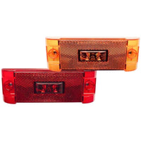 Two TecNiq S22 : PC Rated Side Marker, one red and one orange, on a white background.