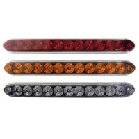 Three rows of LED trailer lights in red, orange, and clear on a white background