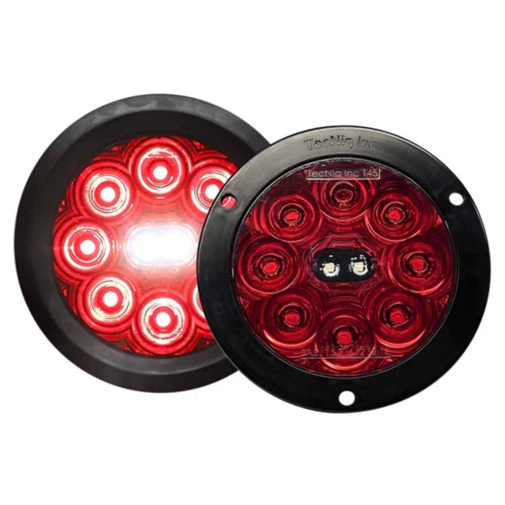 Two round red TecNiq T45 : 4" High Visibility STTR with black rims on a white background