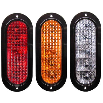 Three TecNiq T62 : 6" Oval Stop/Tail/Turn Flange Mount in red, yellow, and clear on a white background